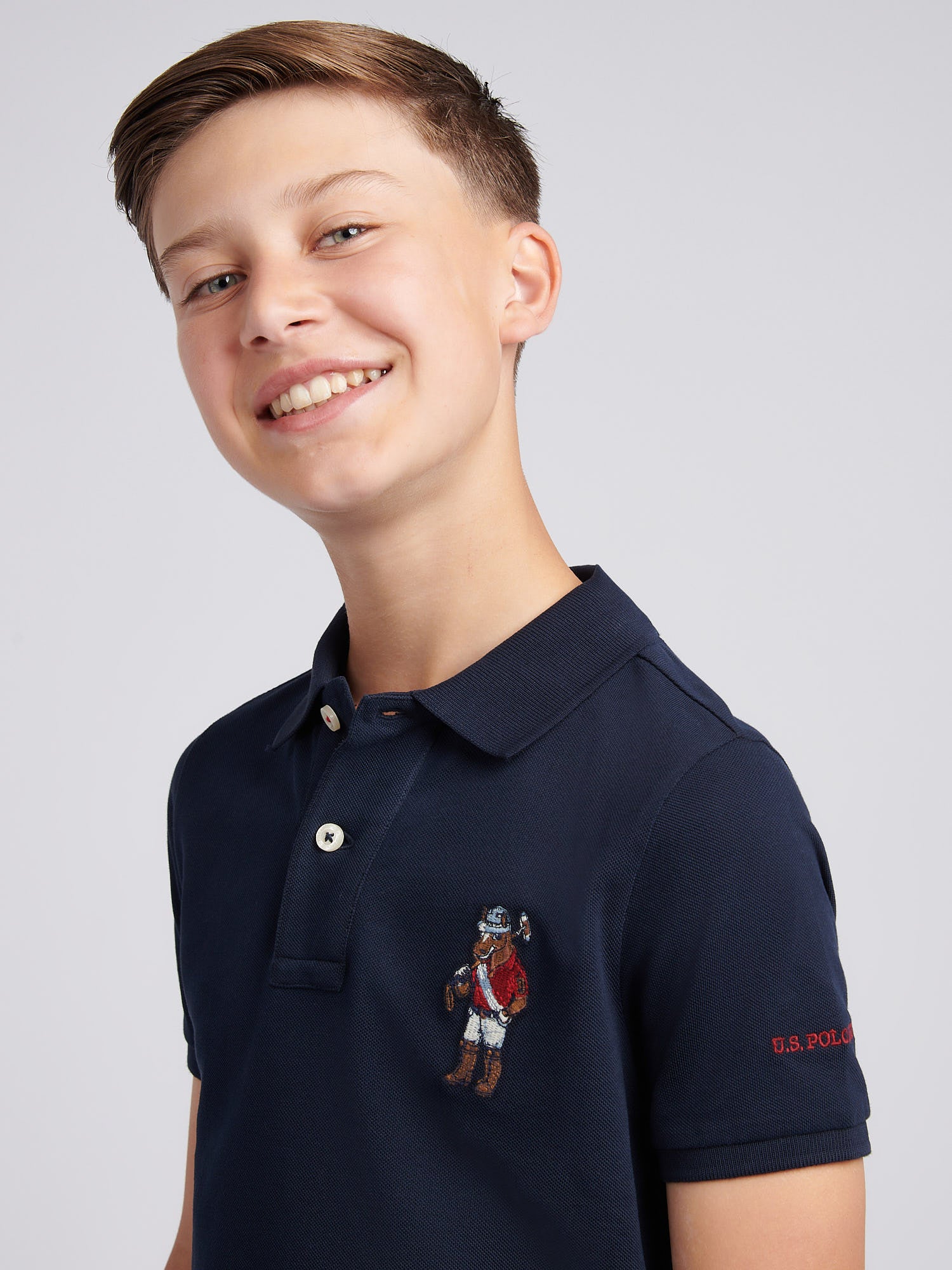 Boys Chuck Polo Shirt in Dark Sapphire Navy - Image 2