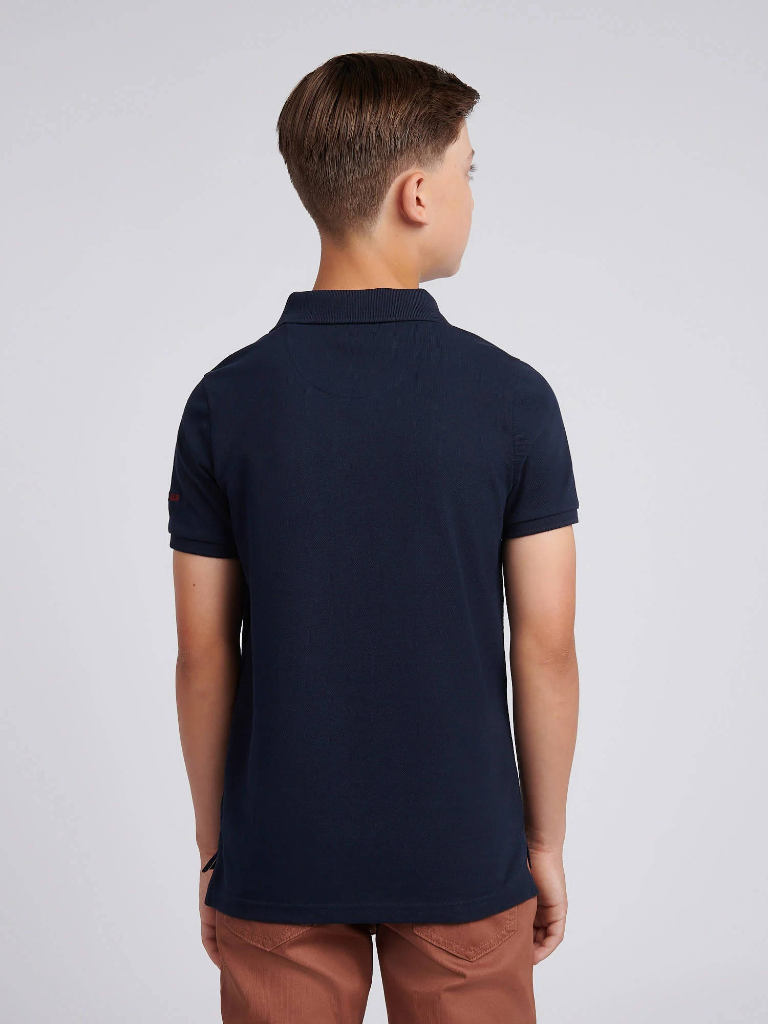 Boys Chuck Polo Shirt in Dark Sapphire Navy - Image 4