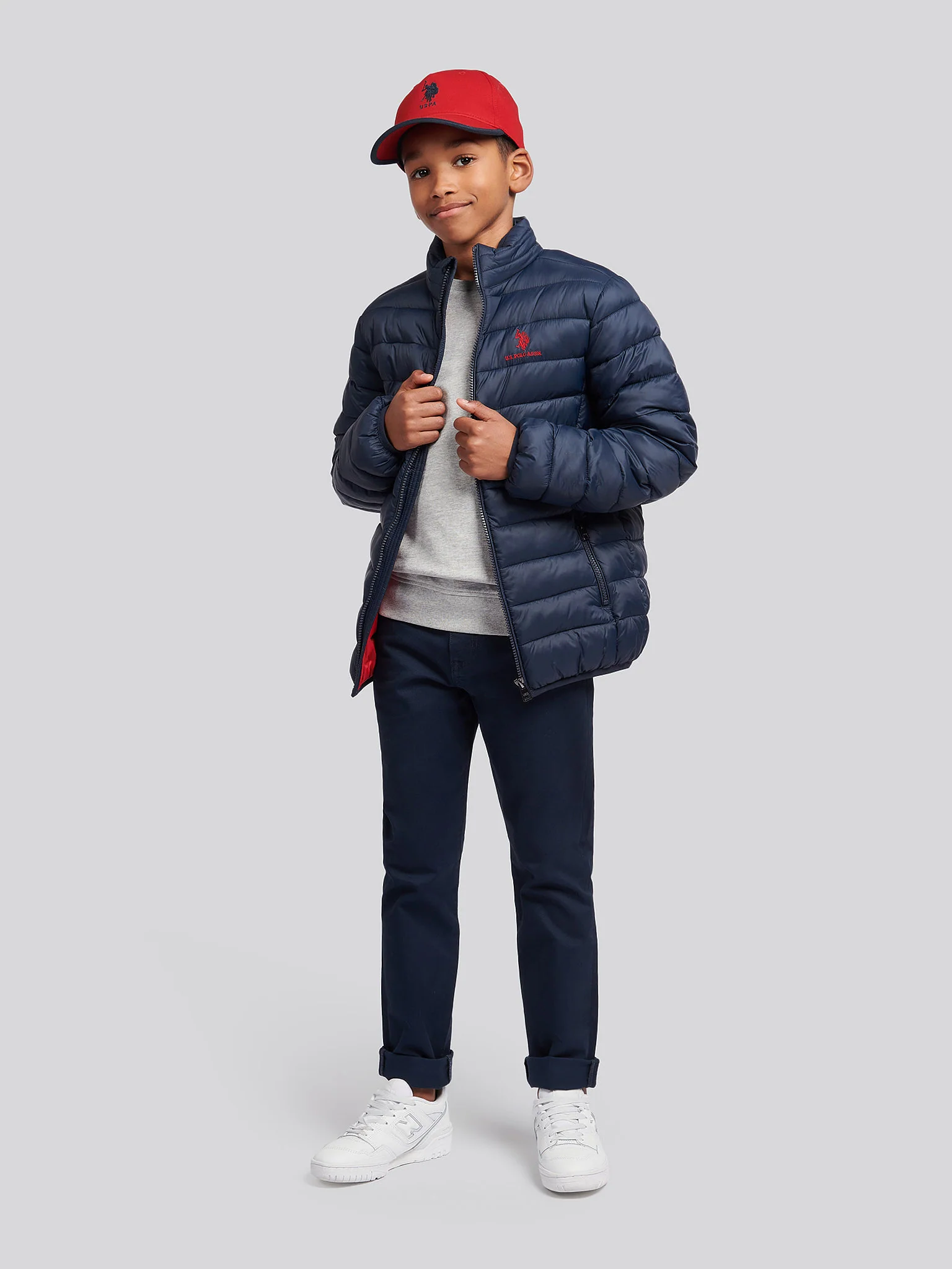 Boys Lightweight Bound Quilted Jacket in Dark Sapphire Navy / Haute Red DHM - Image 3